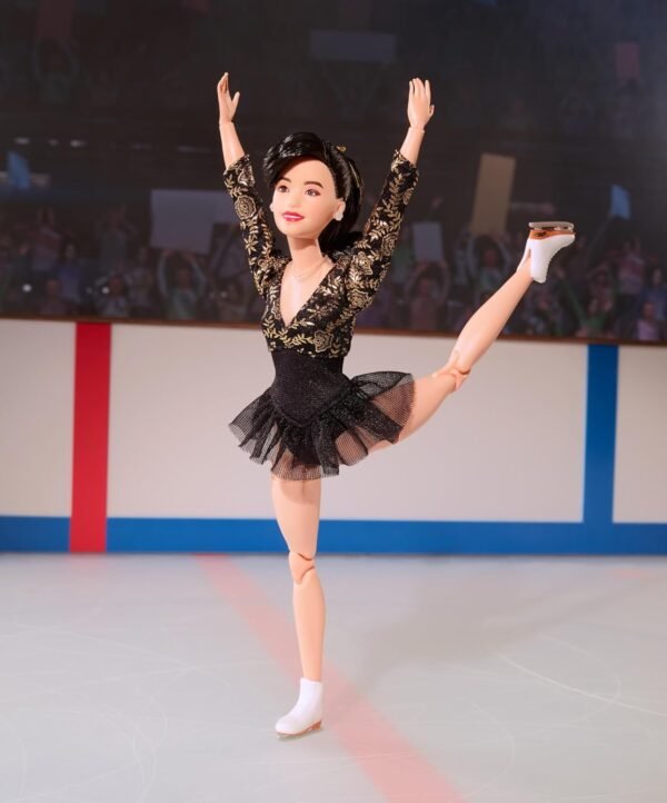 1750523052 Barbie Inspiring Women Doll Kristi Yamaguchi Collectible in 1992 Winter Olympics Costume Sparkly Black and Gold Leotard and White Skates.jpg