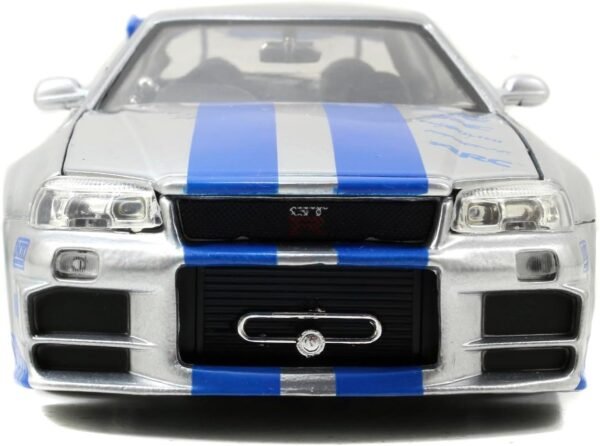 Jada Toys Fast Furious Brians 2002 Nissan Skyline R34 Die cast Car 124 Scale Silver Blue.jpg