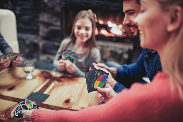 1752830653 Mattel Games UNO Premium 50th Anniversary Edition Matching Card Game Featuring Commemorative Coin 112 Cards Game Night Kids Collectors Gift Ages 7 Years Older.jpg