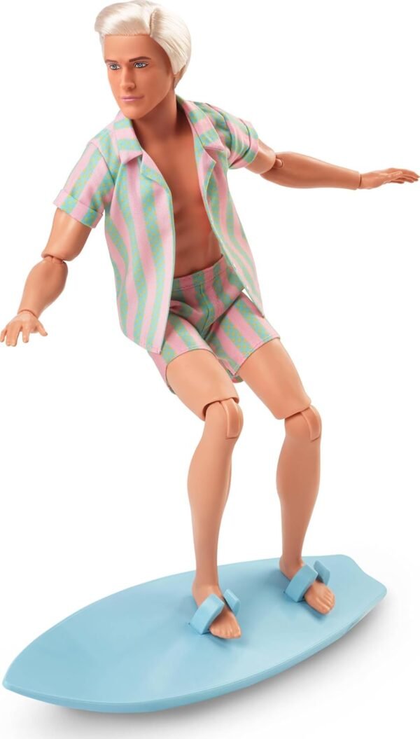 1752884651 Barbie The Movie Ken Doll Wearing Pastel Pink and Green Striped Beach Matching Set with Surfboard and White Sneakers.jpg