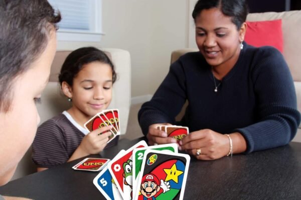 Mattel Games UNO Super Mario Card Game in Storage Travel Tin Video Game Themed Deck for Kids Adults Family Nights with Special Rule.jpg