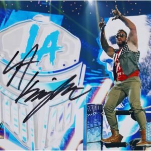 LA Knight WWE Autographed 8 x 10 Standing on Ropes.jpg